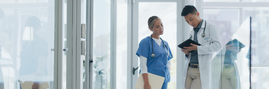 Doctors speaking in a hallway