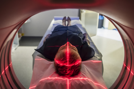 A patient receiving an MRI head scan.