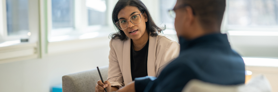 A psychiatrist consults with a patient